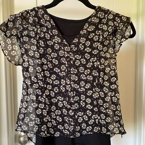 Small. See through fabric (black tank not included)